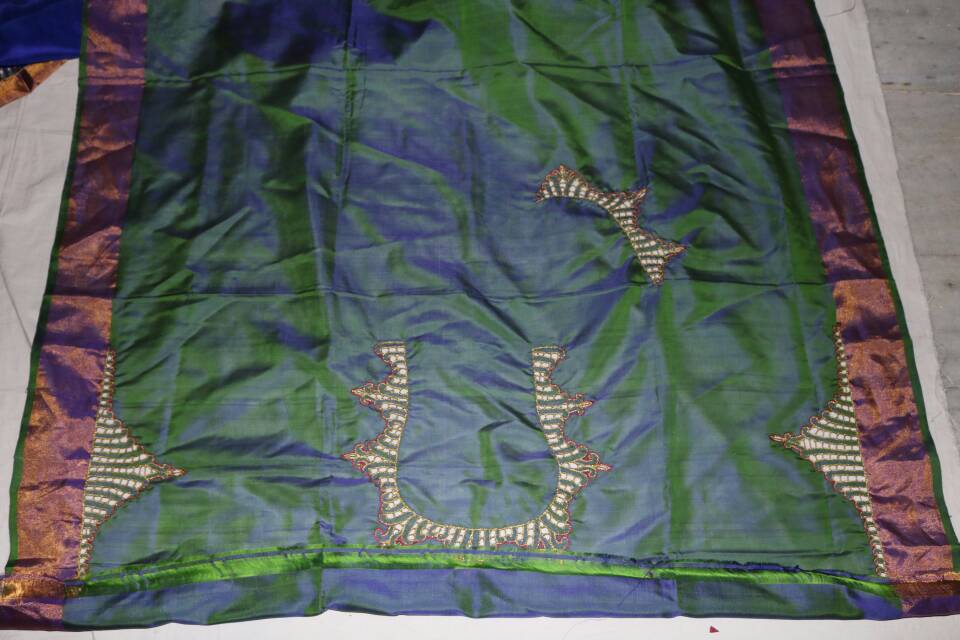 BLUE UPPADA PATTU SAREE WITH CUT WORK BORDER.