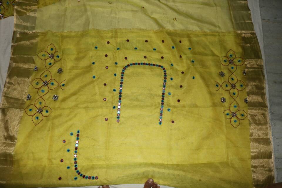 MAHENDI GREEN SILK KOTA SAREE WITH MOGGOM WORK.