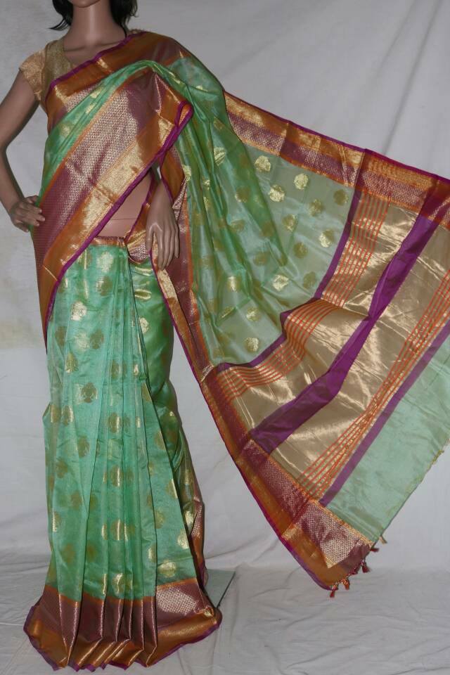 SEA GREEN COLOR ALLOVER WEAVED TUSSAR SAREE.
