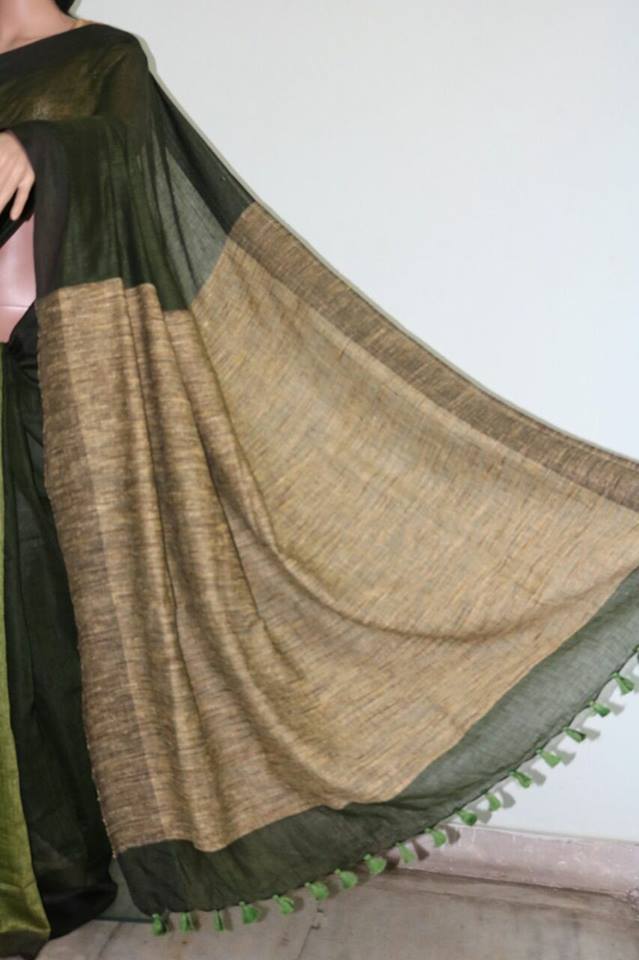 BOTTOL GREEN COLOR PURE LINEN SAREE.