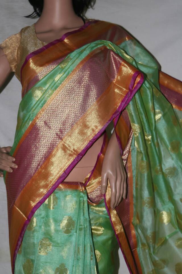 SEA GREEN COLOR ALLOVER WEAVED TUSSAR SAREE.