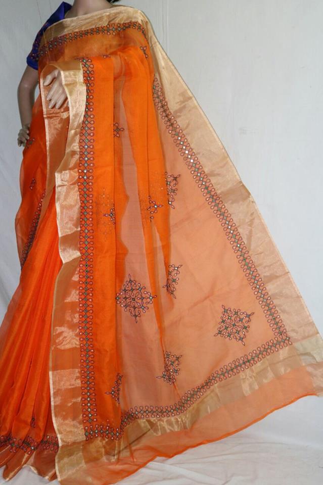 ORANGE SILK KOTA SAREE WITH MUGGU WORK.