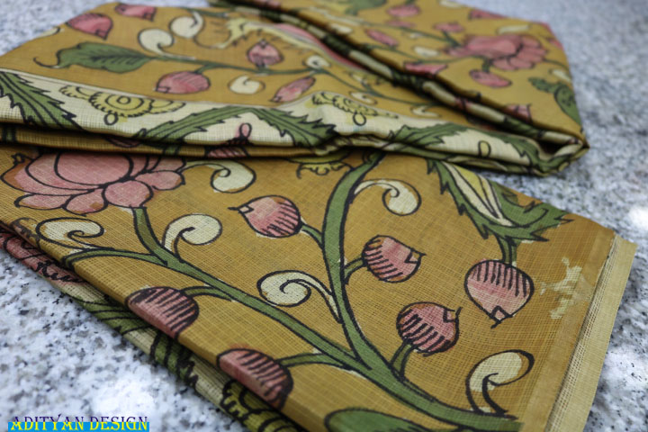 MUSTERED YELLOW COLOR PURE SILK KOTA WITH PEN KALAMAKRI WORK.